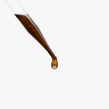Close-up of a dropper with a drop of SUPPLI-X Reishi Mushroom Drops