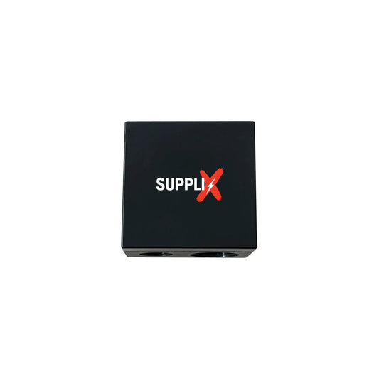 Compact SUPPLI-X dual pencil sharpener in white, sharpening a vibrant red lip pencil with precision blades and attached clean