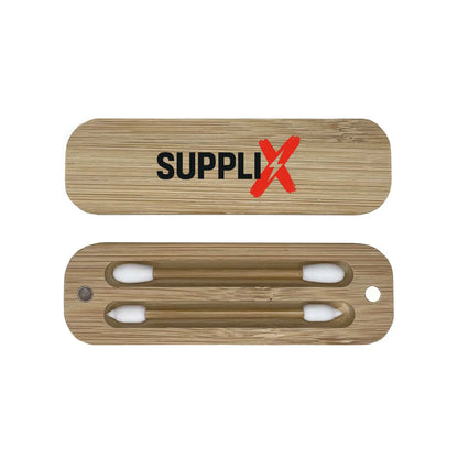 Close-up of eco-friendly silicone reusable makeup swabs with dual tips on sturdy bamboo sticks, stored in portable bamboo car