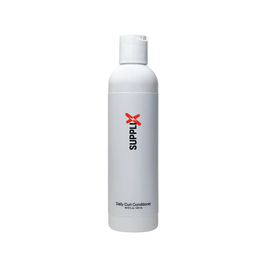 Premium SUPPLI-X Daily Curl Conditioner bottle in creamy white, enriched with panthenol and baobab oil for ultimate curl hydr