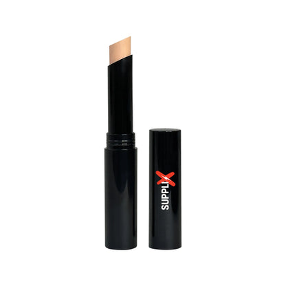 Creamy butter concealer stick gliding on skin, delivering hydrating shea butter infusion for medium to full matte coverage on