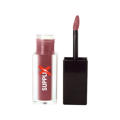 Vibrant dark cherry matte lip stain applied smoothly on lips with doe-foot applicator, infused with Vitamin E for all-day moi