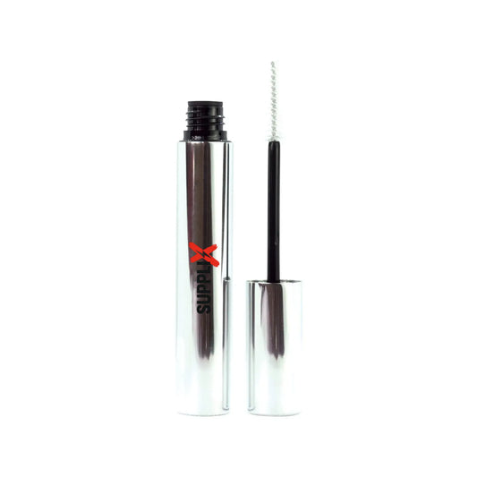 Transparent vegan eyebrow gel wand applying clear formula to shape and hydrate natural brows with sodium hyaluronate for fluf