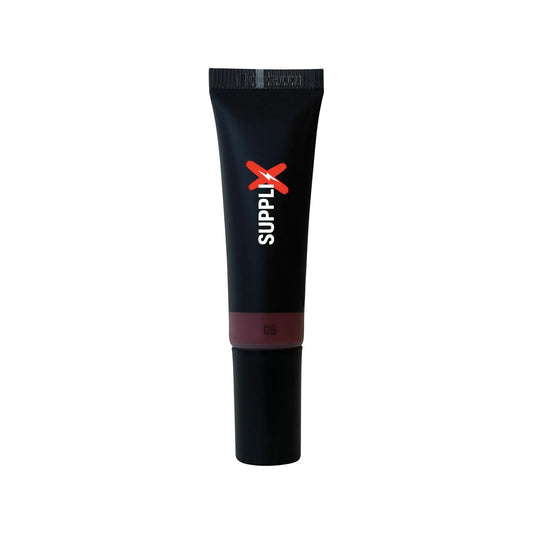 Vibrant cherry red liquid blush in sleek dropper bottle, showing dewy application on diverse skin tones for buildable, vegan 