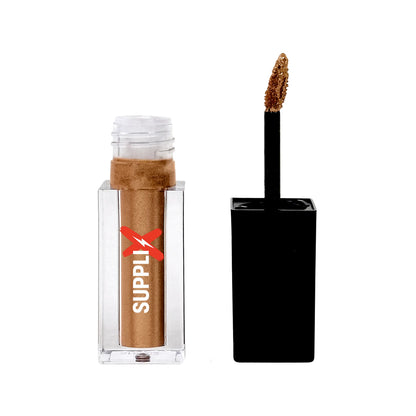 Brilliant Gatsby liquid shimmer swatched on skin, showcasing crease-proof, shimmering finish in versatile vegan formula for e