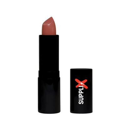 Vibrant Chloe shade luxury matte lipstick gliding on lips, delivering high-pigment coverage and cushiony hydration in long-we