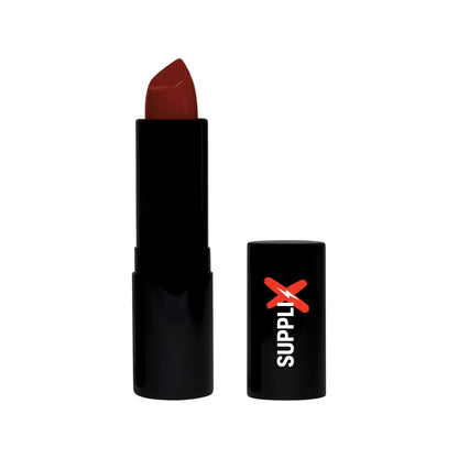 Vibrant red carpet red luxury matte lipstick applied on plump lips, showcasing hydrating vegan formula with full pigment cove