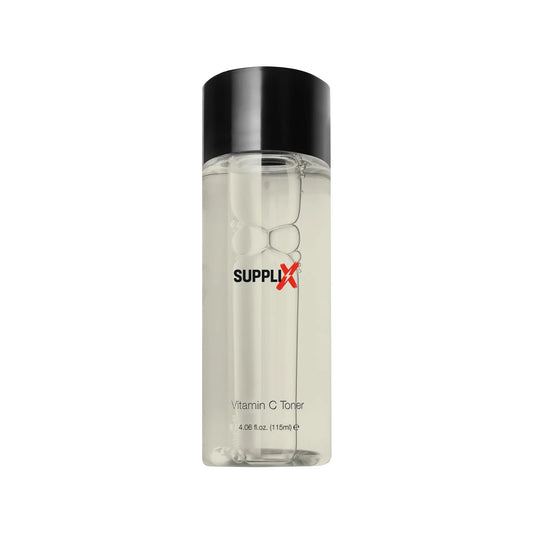 Clear bottle of SUPPLI-X Vitamin C Toner featuring hydrating formula with brightening vitamin C, green tea extracts, witch ha