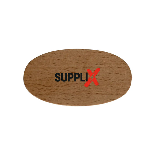 Close-up of SUPPLI-X Beard Nylon Brush with strong polypropylene bristles detangling thick beard hair, compact beech wood han