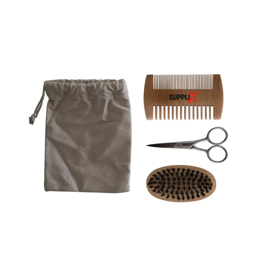 Close-up of SUPPLI-X Men's Grooming Kit featuring sharp stainless steel scissors, natural bamboo comb, and beechwood brush fo
