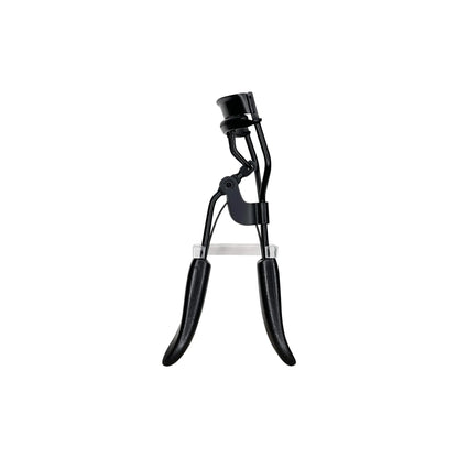 Close-up of SUPPLI-X padded eyelash curler with silicone padding and contoured clamp, curling natural lashes to dramatic flai