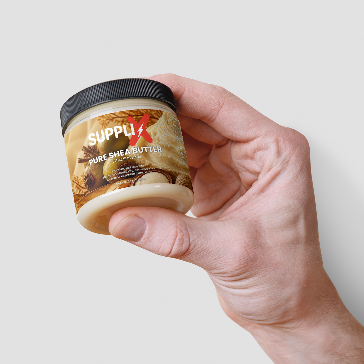 SUPPLI-X Pure Shea Butter jar in hand – photo 3