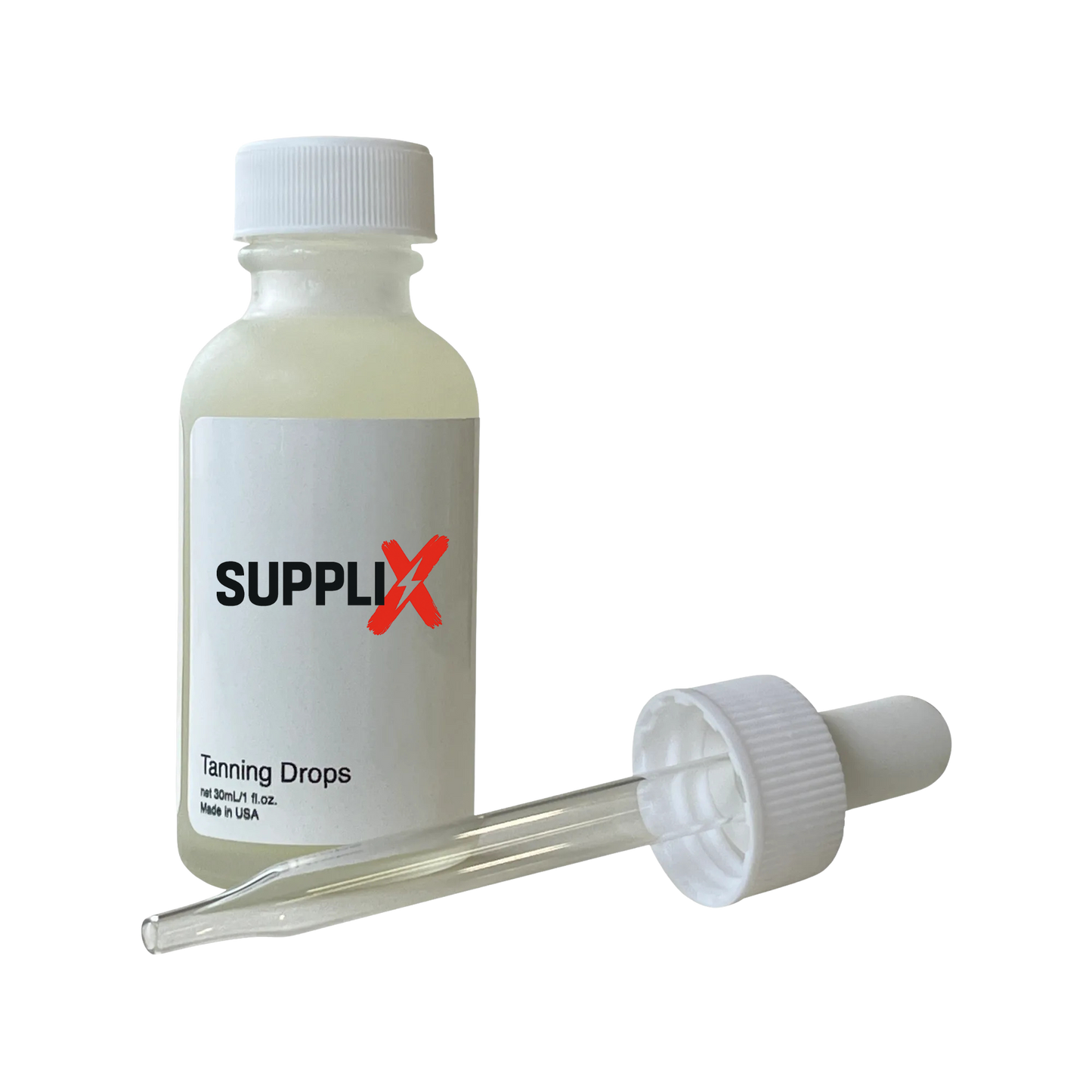 Clear glass dropper bottle of SUPPLI-X vegan tanning drops infused with grapefruit peel oil and coconut oil for intense hydra